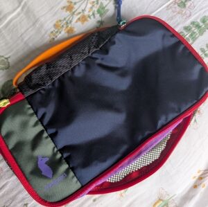 Cotopaxi 7L- Compact Travel Bag